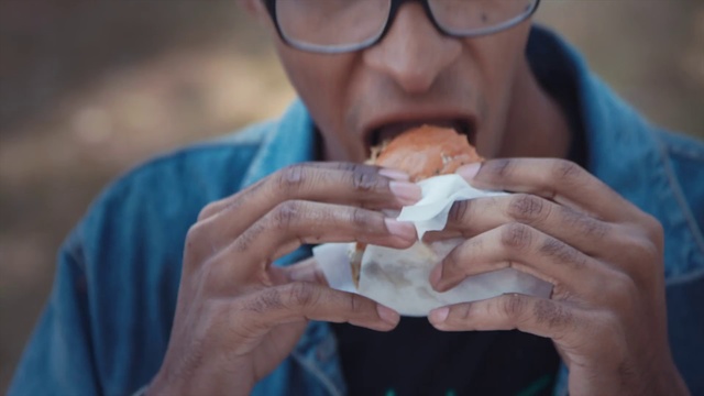 Video Reference: Hand, Junk food, Food, Eating, Dish, Comfort food, Cuisine, Person