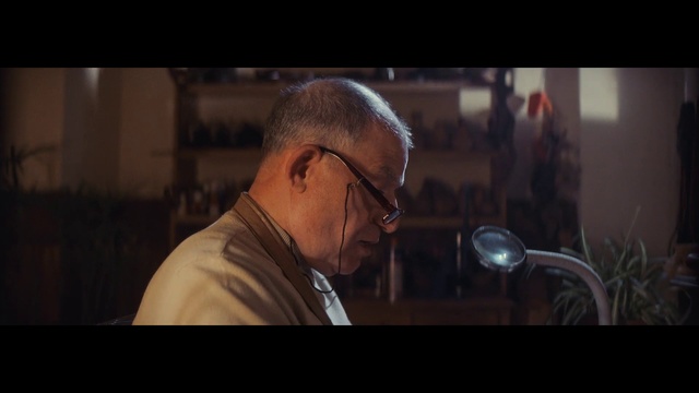Video Reference: Glasses, Human, Photography, Eyewear, Screenshot, Vision care, Darkness, Photo caption, Ear