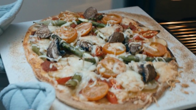 Video Reference: dish, pizza, cuisine, food, italian food, california style pizza, european food, flatbread, pizza cheese, vegetarian food