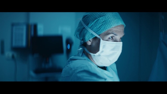 Video Reference: Surgeon, Medical, Medical equipment, Head, Scrubs, Service, Room, Headgear, Personal protective equipment, Photography