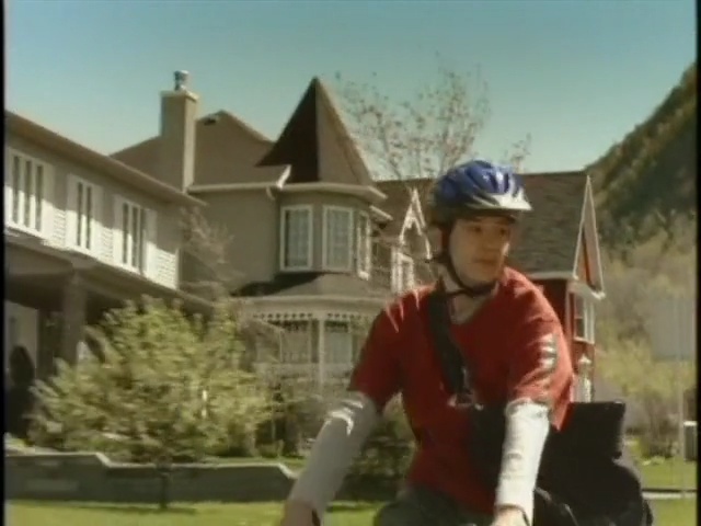 Video Reference: clothing, mode of transport, outdoor recreation, games, recreation, player, grass, lawn, leisure, Person