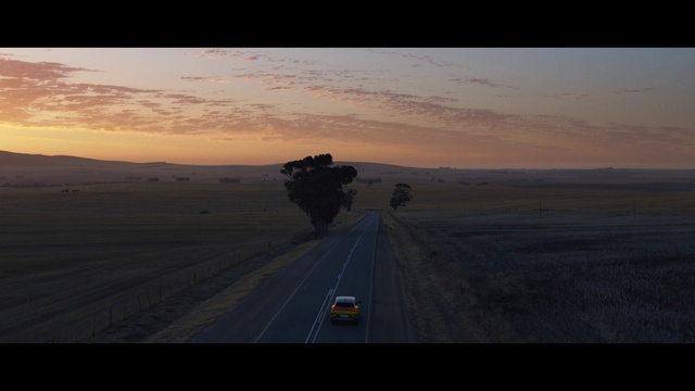 Video Reference: Sky, Horizon, Natural environment, Road, Landscape, Mode of transport, Morning, Ecoregion, Infrastructure, Atmosphere