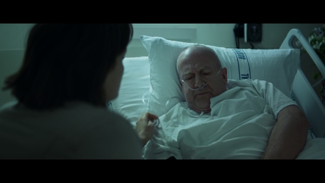 Video Reference: Head, Skin, Human, Mouth, Childbirth, Room, Screenshot, Birth, Hospital, Person, Indoor, Man, Looking, Holding, Bed, Sitting, White, Woman, Laying, Table, Large, Young, Water, Standing, People, Human face