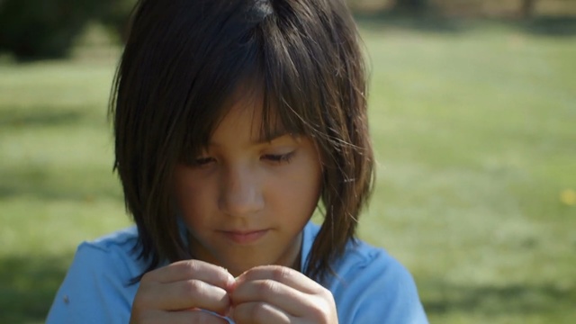 Video Reference: human hair color, hairstyle, girl, black hair, forehead, long hair, mouth, bangs, brown hair, smile, Person