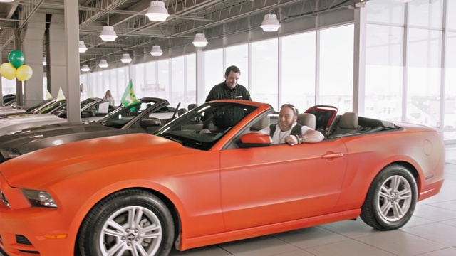 Video Reference: car, motor vehicle, vehicle, convertible, automotive design, auto show, muscle car, personal luxury car, mid size car, classic car, Person