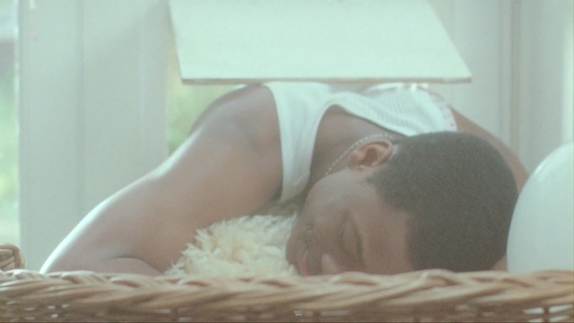 Video Reference: baby bed, cradle, furniture, furnishing, bed, lying, Person