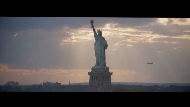 Video Reference: sky, landmark, statue, monument, cloud, daytime, atmosphere, horizon, morning, skyline, Person
