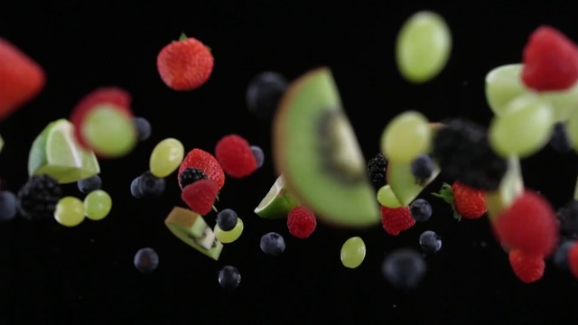 Video Reference: Sweetness, Macro photography, Food, Organism, Still life photography, Font, Plant, Fruit, Confectionery, Photography, Person, Indoor, Table, Cake, Decorated, Small, Birthday, Black, Sitting, Made, Plate, White, Brush, Red, Standing, Blue
