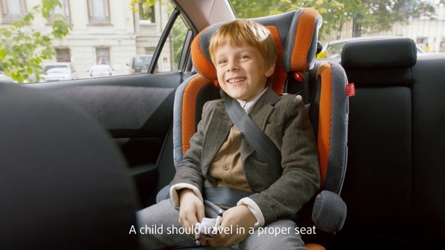 Video Reference: car, family car, car seat, sitting, automotive design, vehicle, luxury vehicle, child, product, Person