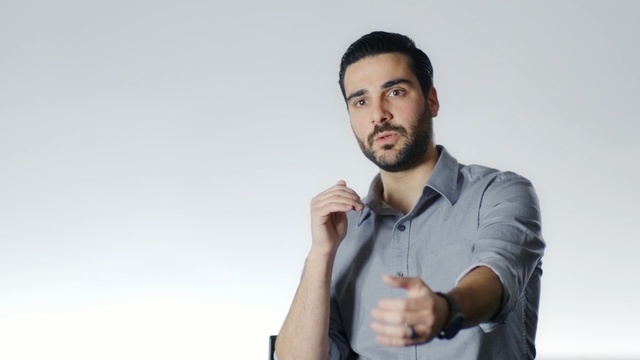 Video Reference: white collar worker, facial hair, microphone, Person