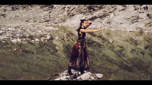 Video Reference: rock, girl, recreation, geology, adventure, sky, fault, screenshot, tree, water