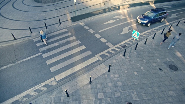 Video Reference: Road, Intersection, Pedestrian, Pedestrian crossing, Lane, Street, Zebra crossing, Infrastructure, Mode of transport, Line