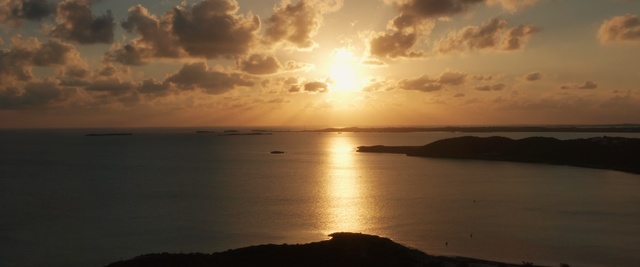 Video Reference: Sky, Horizon, Nature, Sea, Sunset, Sunrise, Cloud, Afterglow, Sun, Calm, Person