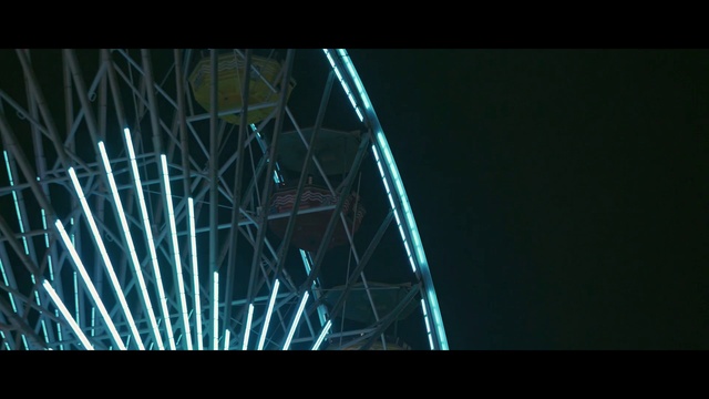 Video Reference: Light, Darkness, Line, Architecture, Tourist attraction, Midnight, Night, Symmetry, Space, Ferris wheel