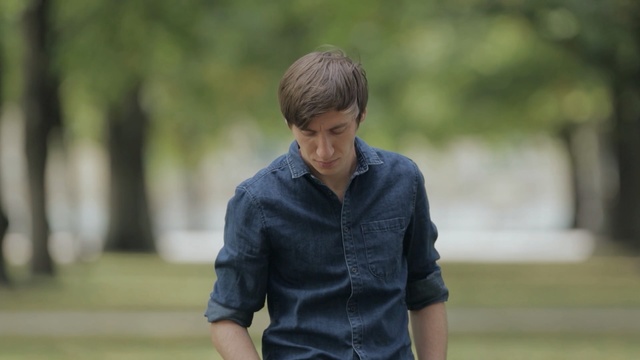 Video Reference: Grass, Male, Human, Photography, Tree, Sitting, Outerwear, Jeans, Sleeve, Denim, Person