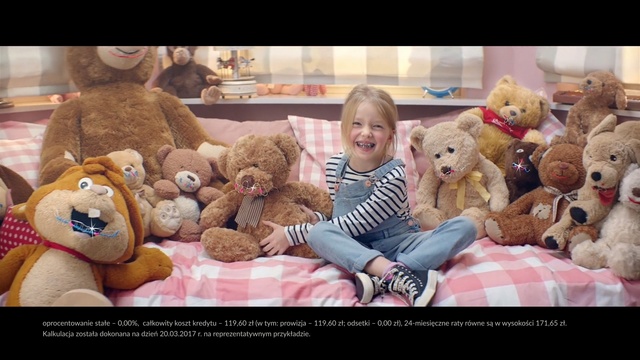 Video Reference: Teddy bear, Stuffed toy, Toy, Child, Plush, Puppy love, Person, Indoor, Stuffed, Animal, Sitting, Large, Photo, Bed, Teddy, Man, Bear, Holding, Woman, Row, Room, Riding, Baby, Red, Display, Group, White, Dog, Text, Toddler, Cute, Carnivore, Clothing, Crowd