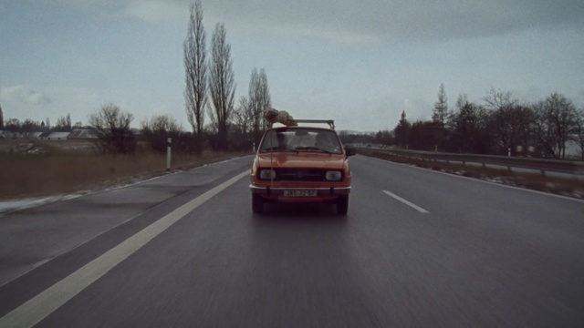 Video Reference: road, car, motor vehicle, land vehicle, asphalt, lane, highway, vehicle, infrastructure, road trip