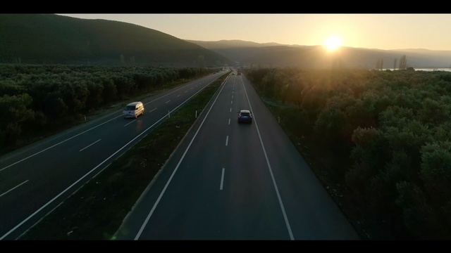Video Reference: Road, Highway, Freeway, Lane, Horizon, Nature, Sky, Mode of transport, Atmospheric phenomenon, Infrastructure, Person