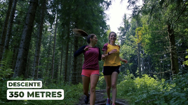 Video Reference: People in nature, Nature, Forest, Natural environment, Tree, Natural landscape, Wilderness, Jungle, Old-growth forest, Biome, Outdoor, Woman, Grass, Young, Holding, Wood, Game, Girl, Playing, Female, Standing, Riding, Yellow, Walking, Wearing, Field, Frisbee, Ball, Man, Park, Throwing, Skiing, Street, Sign, People, Dirt, Air, Clothing, Person, Shorts, Smile, Text, Footwear, Plant, Wooded