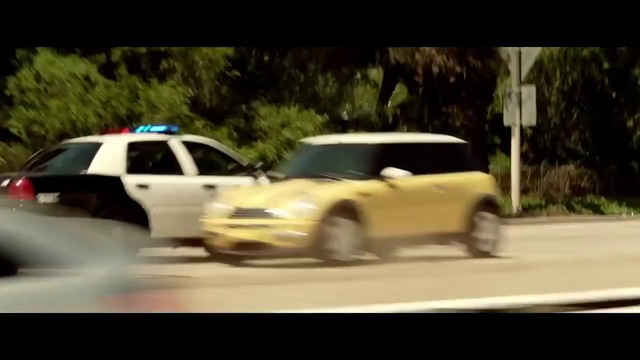 Video Reference: Land vehicle, Vehicle, Car, Automotive exterior, Police car, Driving, Law enforcement, Mid-size car, Family car, Auto part