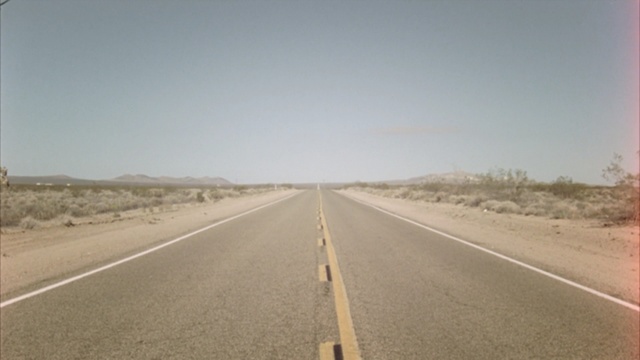 Video Reference: Road, Highway, Asphalt, Road trip, Lane, Natural environment, Thoroughfare, Atmospheric phenomenon, Road surface, Infrastructure