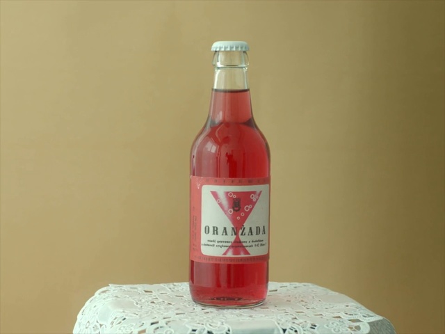 Video Reference: Bottle, Drink, Liqueur, Glass bottle, Distilled beverage, Alcoholic beverage, Alcohol, Liquid, Rosolio, Person