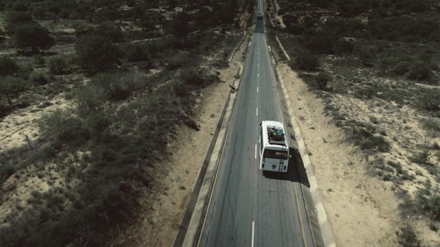 Video Reference: track, transport, road, mode of transport, lane, geological phenomenon, thoroughfare, rail transport, sky, tree