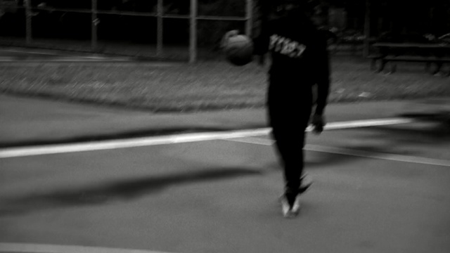 Video Reference: white, black, man, photograph, black and white, person, shadow, standing, day, infrastructure