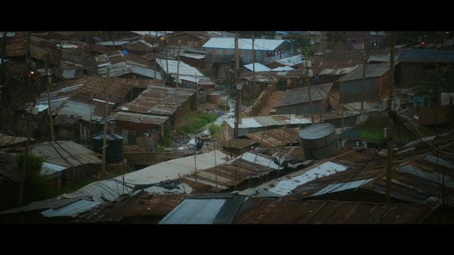 Video Reference: urban area, slum, residential area, screenshot, earthquake, disaster, sky, suburb, roof, village