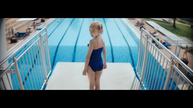 Video Reference: Photograph, Blue, Child, Fun, Toddler, Turquoise, Aqua, Snapshot, Vacation, Summer, Fence, Indoor, Person, Young, Small, Laptop, Looking, Board, Striped, Girl, Standing, Table, Front, Man, Sitting, Bed, Woman, Computer, Holding, Monitor, Screen, Boy, Surfing, Television, Room, White, Riding, Kitchen, Playing, Doing, Swimming, Swimwear, Clothing, Swimming pool, Human face, Dress