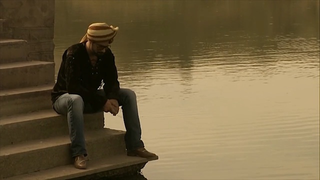 Video Reference: water, sitting, reflection, recreation, Person