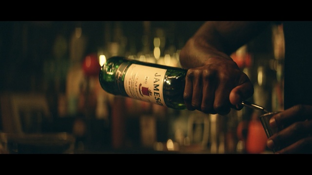 Video Reference: Alcohol, Liqueur, Drink, Bottle, Distilled beverage, Glass bottle, Alcoholic beverage, Hand, Photography, Wine bottle, Person