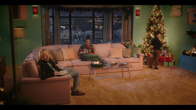 Video Reference: Christmas tree, Christmas, Living room, Room, Couch, Christmas decoration, Christmas eve, Tree, Furniture, Interior design, Person