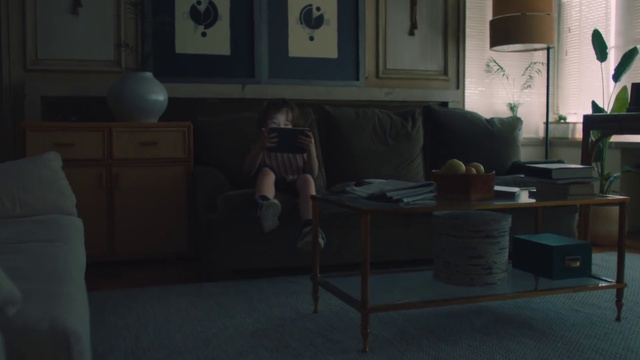 Video Reference: Room, Furniture, Couch, Floor, Living room, Table, House, Photography, Sitting, Flooring