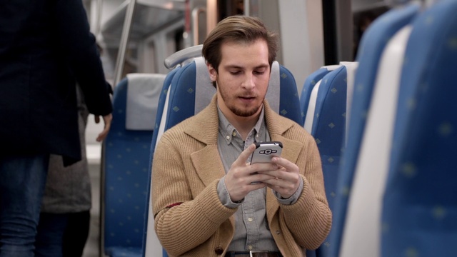 Video Reference: Joint, Shoulder, Standing, Street fashion, Blazer, White-collar worker, Audio equipment, Event, Job, Sitting