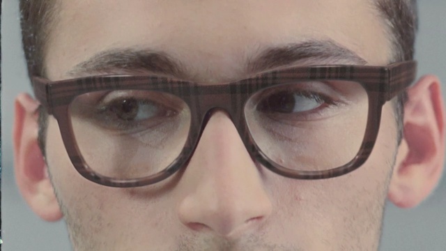 Video Reference: eyewear, eyebrow, glasses, vision care, nose, chin, close up, forehead, eye, goggles