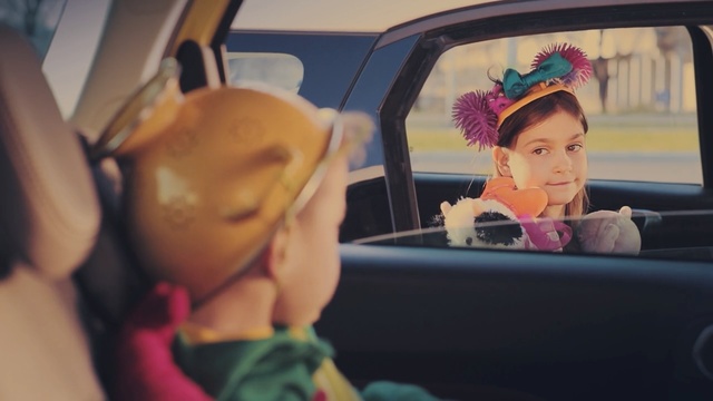 Video Reference: car, family car, child, girl, fun, toddler, product, car seat, Person