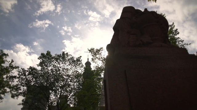 Video Reference: sky, cloud, tree, monument, sunlight, temple, rock, meteorological phenomenon, tourism