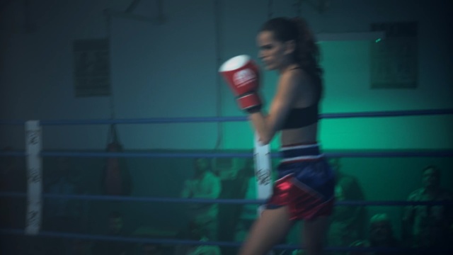 Video Reference: boxing ring, blue, red, black, photograph, boxing, boxing equipment, darkness, room, sport venue