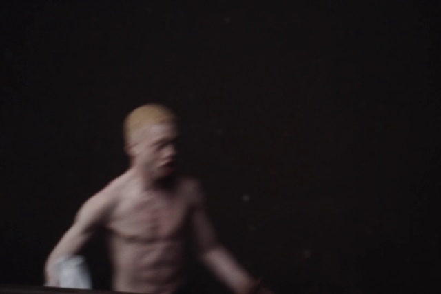 Video Reference: Black, Darkness, Performance, Human, Muscle, Human body, Barechested, Photography, Hand, Room