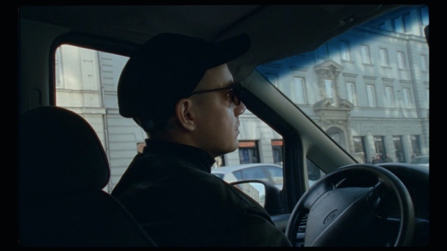 Video Reference: Mode of transport, Driving, Vehicle door, Rear-view mirror, Automotive mirror, Auto part, Vehicle, Automotive design, Headgear, Person