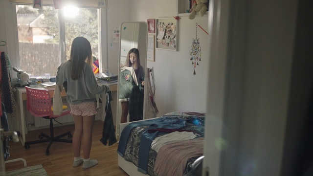 Video Reference: room, textile, product, interior design, girl, boutique, furniture, Person