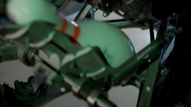 Video Reference: Green, Motor vehicle, Vehicle, Mecha, Machine, Auto part, Motorcycle, Engine, Robot, Fictional character