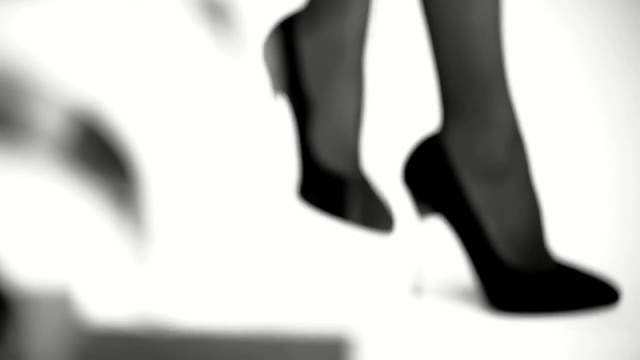 Video Reference: Footwear, White, High heels, Black, Shoe, Black-and-white, Human leg, Leg, Joint, Ankle