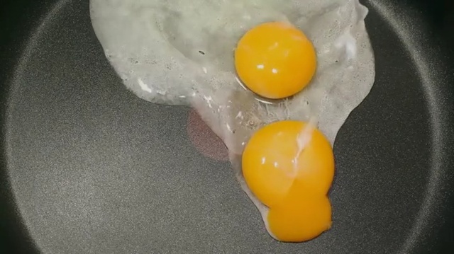 Video Reference: Egg yolk, Egg white, Food, Dish, Ingredient, Egg, Cuisine, Egg, Fried egg, Person