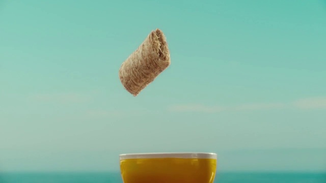Video Reference: Product, Organism, Drink, Junk food, Orange juice, Liquid, Juice, Water, Cup, Table, Food, Sitting, Coffee, Front, Glass, Boat, Large, Orange, Glasses, White, Ocean, Soft drink, Beverage, Beach
