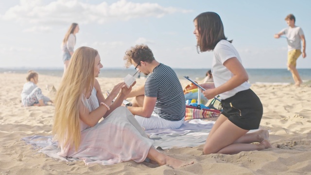 Video Reference: People on beach, Photograph, Fun, Vacation, Sand, Summer, Beach, Friendship, Sitting, Sea