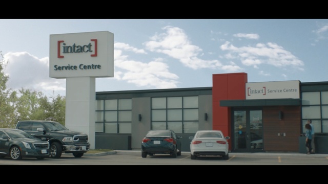 Video Reference: Building, Car, Vehicle, Signage, Font, Real estate, Sign, Commercial building, Facade, Subcompact car