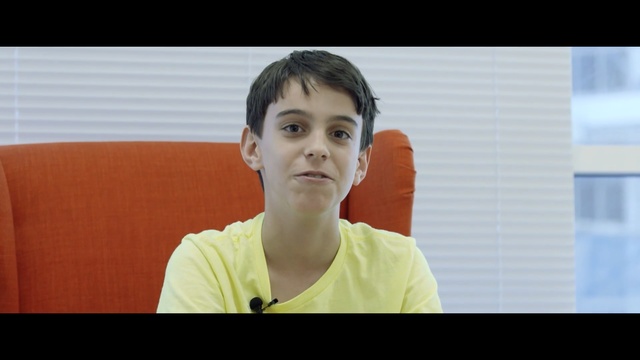 Video Reference: Face, Forehead, Chin, Cheek, Human, Sitting, Smile, Conversation, Gesture, Person