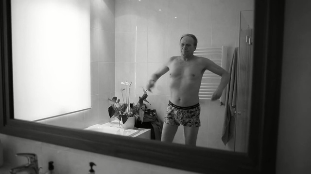 Video Reference: White, Black, Photograph, Barechested, Black-and-white, Room, Snapshot, Male, Muscle, Standing, Person